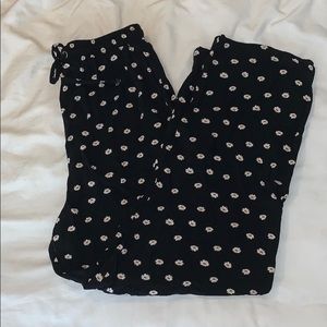 Black daisy crop pants
